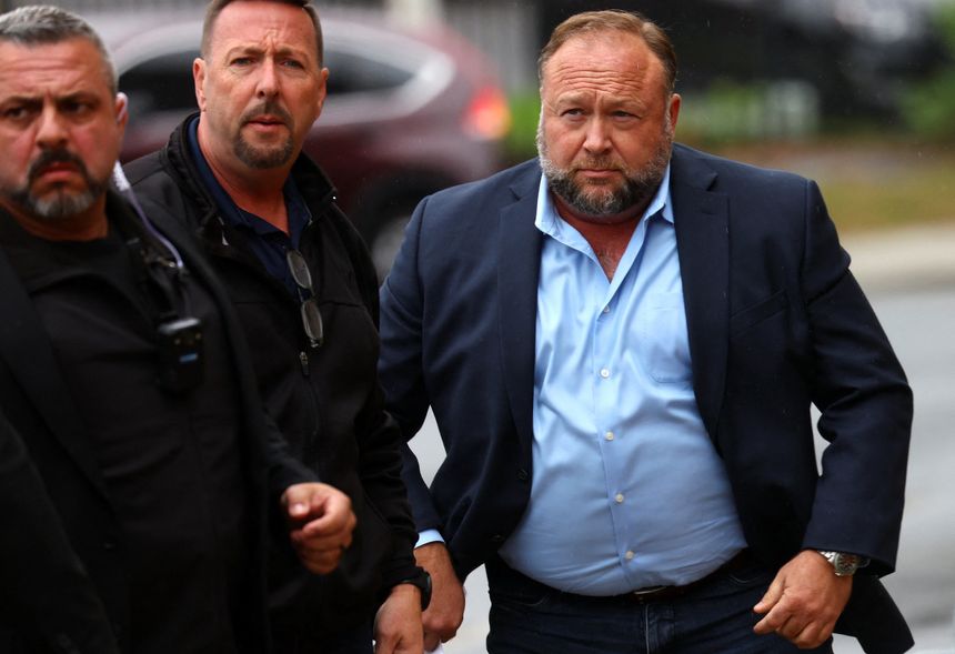 Alex Jones files for bankruptcy after court orders him to pay nearly $1 billion to families of Sandy Hook victims