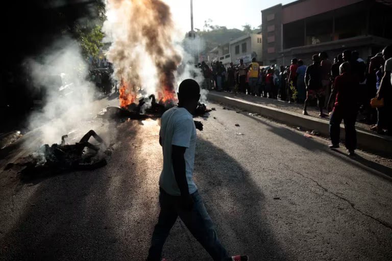 GRAPHIC: Haitian citizens stone and burn gang members bodies in Port-au-Prince