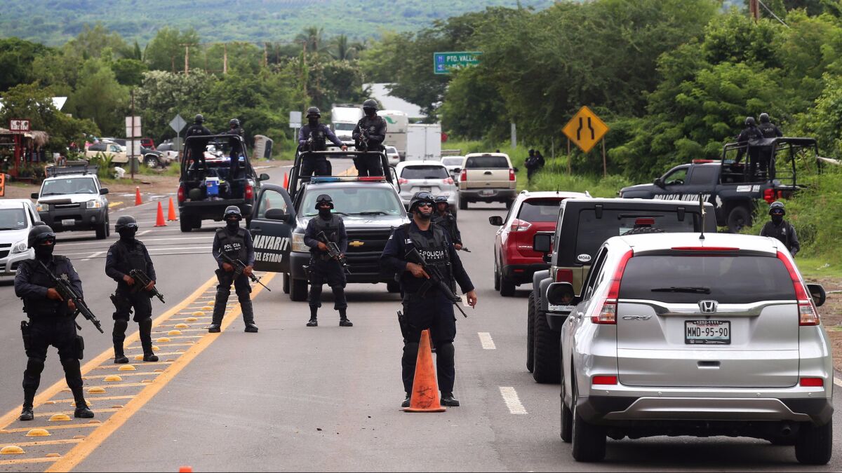 Mexican Authorities Discover 129 Migrants Hidden in Trailer