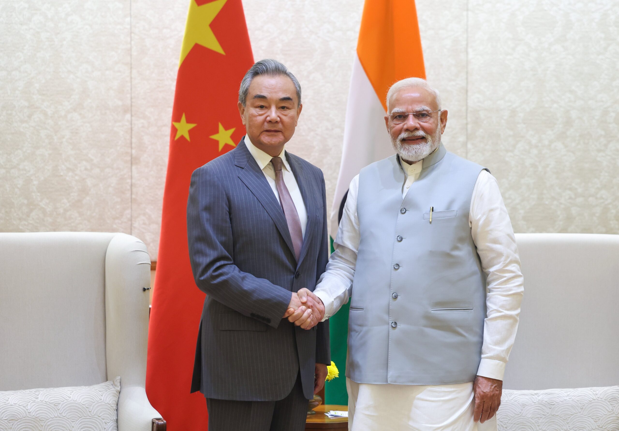 Top Chinese Official Meets with Indian Prime Minister Modi, Vows to Improve Relations