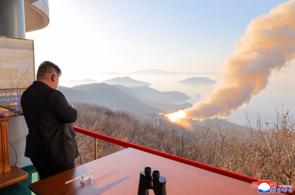 North Koreas Kim Jong Un observes a ground ejection test of what KCNA says is a high output solid fu